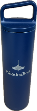 A dark blue insulated travel tumbler with a carry handle lid, featuring the Wooden Boat logo printed in white on the front, isolated on a white background.