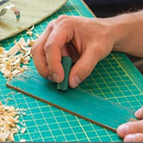 charging a leather strop with buffing compound