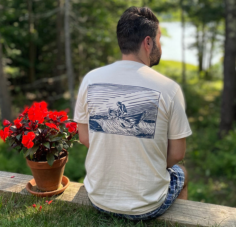 Sitting on the dock of the bay, watchin' the tide roll away, so you might as well be wearing a Dory T-shirt to complete the effect.