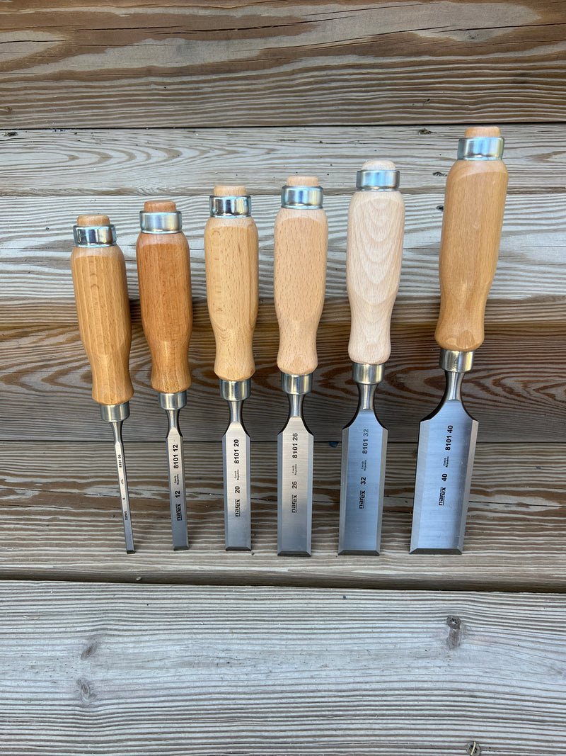 Set of bevel edge chisels in wooden box